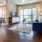 a living room with a blue couch