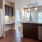 a kitchen with black cabinets