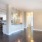 a large kitchen with white cabinets